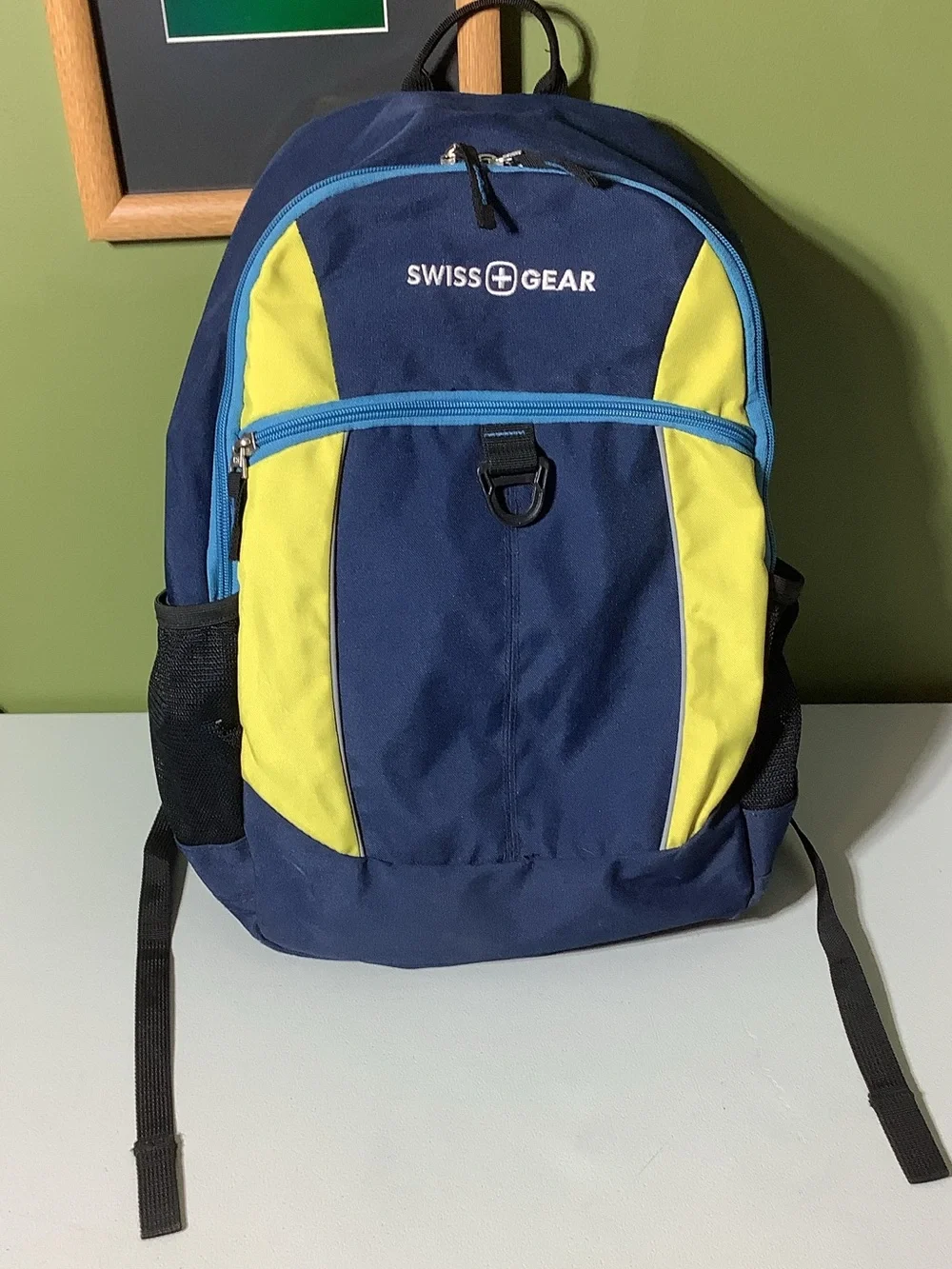 Swiss Gear navy, blue, yellow, and black backpack